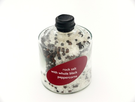 Rock salt with whole black peppercornsの写真素材