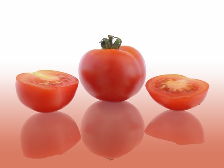 Red tomatoes isolated on whiteの写真素材