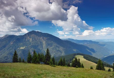 The end of summer. The picture is made in mountains Carpathians, Ukraine. Ahead mountain Petrosul, the Marmarossky file, on border with Romania.の写真素材