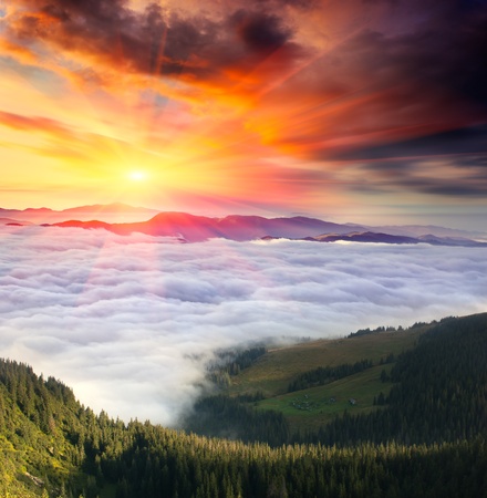 Landscape in the mountains with a cloudy sky colors the sunset. Ukraine, the Carpathian mountainsの写真素材