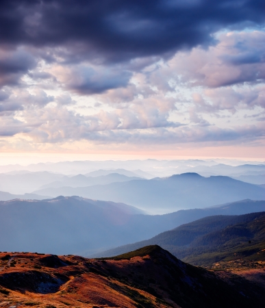 Autumn landscape in the early morning in the mountainsの写真素材