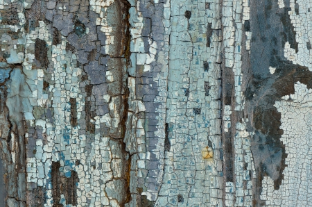 Old wood with abstract cracked paintの写真素材