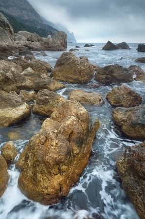 Seascape cloudy day  Bad weather at sea  Dramatic light on the seashore  Crimea, Ukraine, Europeの写真素材