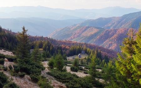Autumn landscape with old wooden church in the mountains  Carpathians, Ukraineの写真素材