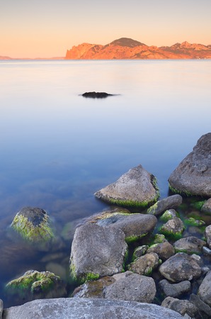 Morning landscape on the sea  Beach with stonesの写真素材