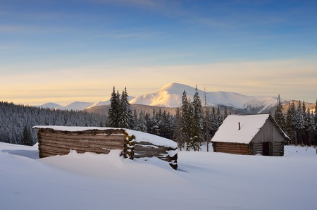 Winter landscape with hut. Sunrise in the mountains. Carpathians, Ukraine, Europeの写真素材