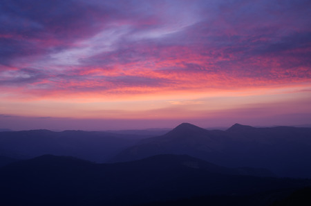 Mountain landscape with the beautiful sky and clouds at sunrise. Carpathians, Ukraine, Europeの写真素材