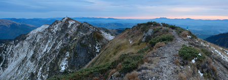 Landscape panorama with a trail. Autumn in mountains. Morning before dawn. Carpathians, Ukraine, Europeの写真素材