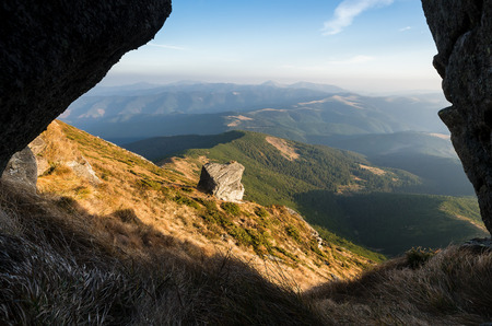 Beautiful stone on a slope. Mountain landscape. Sunny day in autumn. Carpathian mountains, Ukraine, Europe. Beautiful natureの写真素材