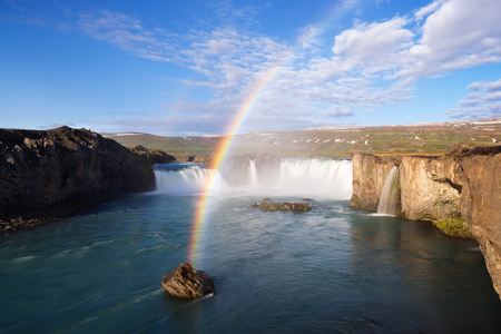 Godafoss waterfall and rainbow. Summer landscape in Iceland, Europe. Sunny morningの写真素材