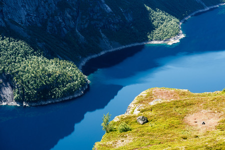 Ringedalsvatnet - mountain Lake near Trolltunga. Norwegian landscape in sunny weather