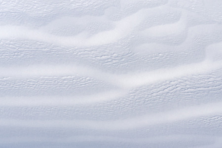 Snow texture. White background with abstraction in natureの写真素材