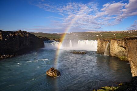 View of Godafoss waterfall with a rainbow. Summer landscape of Iceland. Amazing in natureの写真素材