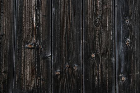 Texture of old wooden boards. Dark natural backgroundの写真素材