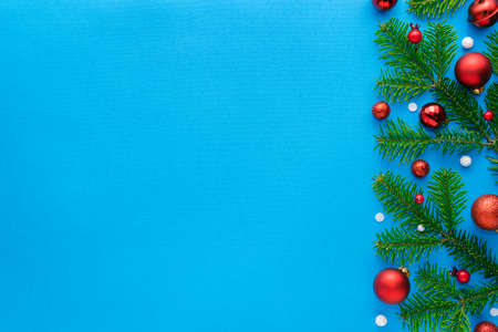Christmas card with fir branches border. Top view, copy space for festive textの写真素材