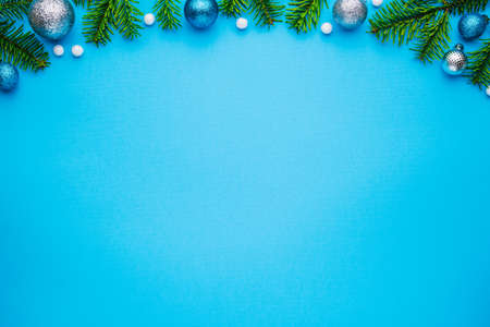 Blue background for Christmas and New Year design. Top view, copy space for festive textの写真素材