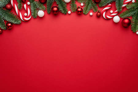Red background with holiday border for Christmas design. Blank with a copy space for textの写真素材