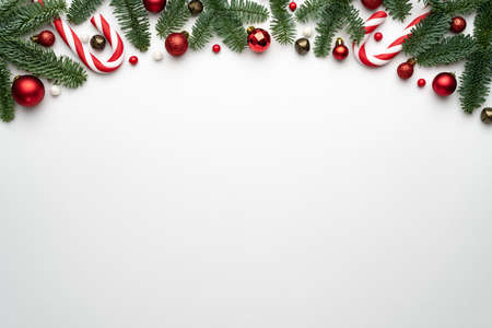 Christmas banner with holiday border on white background. Banner or poster template with place for textの写真素材