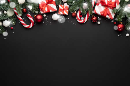 Black background with christmas decorations and and copy space for textの写真素材