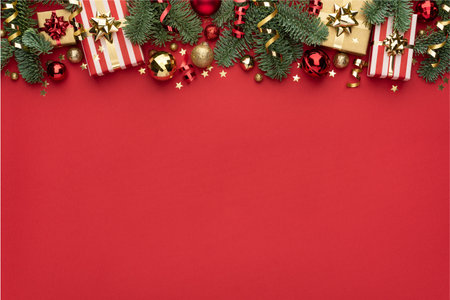 Christmas Ornament Border on Red Background with Copy Spaceの写真素材