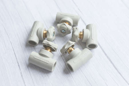 Five polypropylene water tap in circle . Close up of gray tap in cold colorsの写真素材