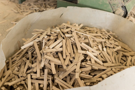 Pile of wood shavings for sale in a market.の写真素材