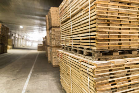 The close up of folded decorative stuff untreated wooden blocks in production