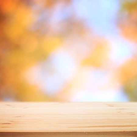 Fall blurred background with wooden table for your design. Vector illustration.のイラスト素材