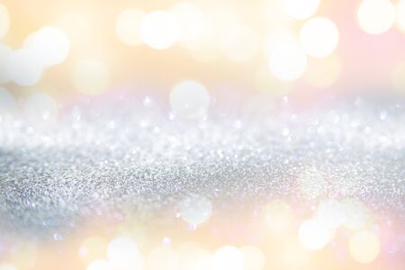 Glitter vintage lights background, the silver and black. Image defocused.の写真素材