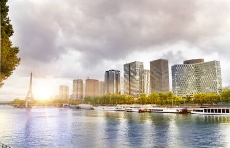 Eiffel Tower, Seine river and Statue of Liberty in Paris, France. Boats on Seine river.の写真素材