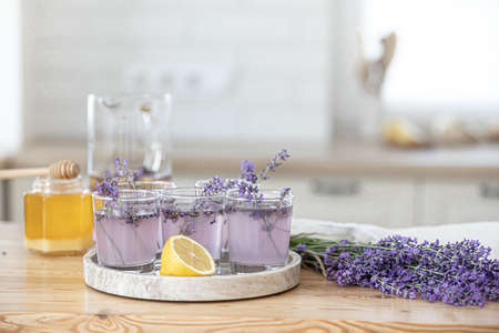 Preparation of fresh lavender lemonade. Step 7, ingredients for a making summer fresh cocktail. Users guide. Drink in the kitchen.の写真素材