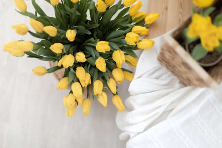 Home interior with a fresh bouquet of tulips.の写真素材