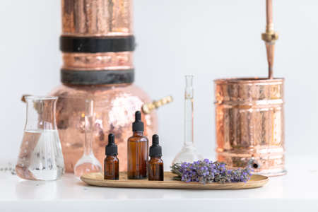 Distillation of lavender essential oil. Copper alambic in a Scandinavian interior. Chemical laboratoryの写真素材
