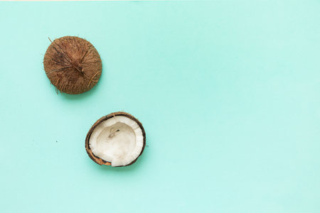Tropical background with coconut on a blue background.