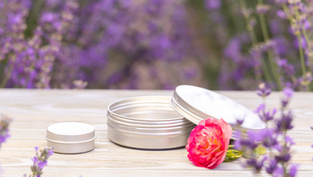 Amber essential lavender oil bottle. Violet lavendar field in Provence.の写真素材