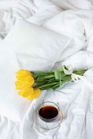 Home interior with a fresh bouquet of tulips.の写真素材