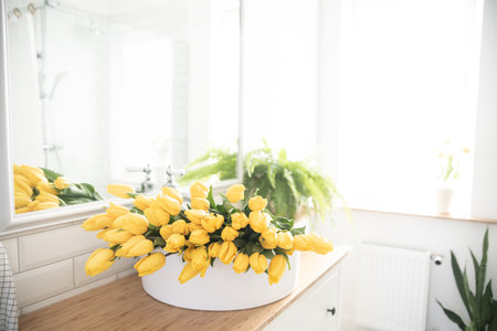 Zero waste concept. A bouquet of peonies in the bathroom.の写真素材