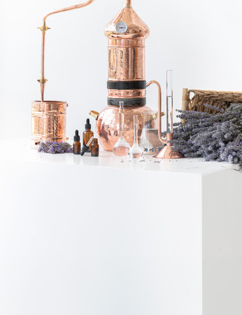 Distillation of lavender essential oil. Copper alambic in a Scandinavian interior. Chemical laboratoryの写真素材