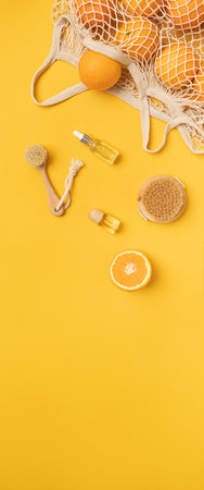 Bottle essential oils on tropical background. Skin and body care treatment concept.の写真素材