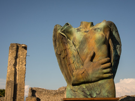 Igor Mitoraj sculptures in Pompei ruins, Italyの写真素材