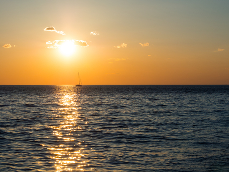 Beautiful sunset in Adriatic sea, Montenegro, captured from a sailing boatの写真素材