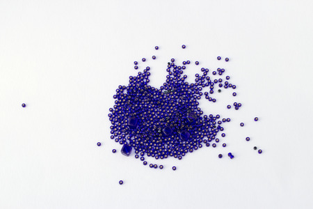 Blue beads isolated on white background. Abstract. Decorative.の写真素材