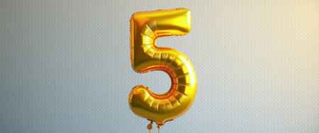 A gleaming golden balloon shaped like the number 5 stands out against a subtle textured backdrop, radiating a festive vibe. This vibrant decoration is perfect for celebrations, symbolizing milestones and joyful moments.の素材
