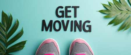 A pair of stylish sneakers with pink accents rests on a vibrant turquoise background, surrounded by lush green tropical leaves. The bold message GET MOVING encourages an active lifestyle, blending fitness motivation with a refreshing, nature-inspired aesthetic.の素材