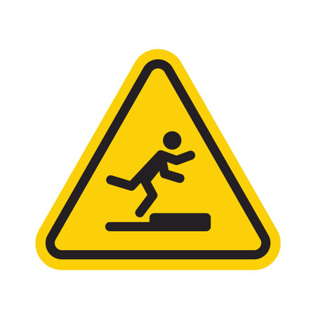 Stumbling man icon in yellow triangle. A warning sign about the danger. Tripping hazard. Watch your step symbol. Isolated vector illustration on white backgroundのイラスト素材