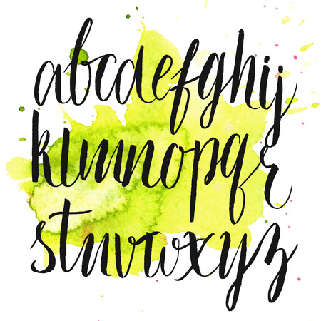 Vector brush alphabet at green watercolor splash. Artistic hand drawn letters.のイラスト素材