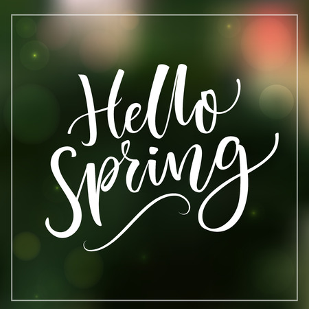 Hello Spring. Modern calligraphy text at green blur backgroundのイラスト素材