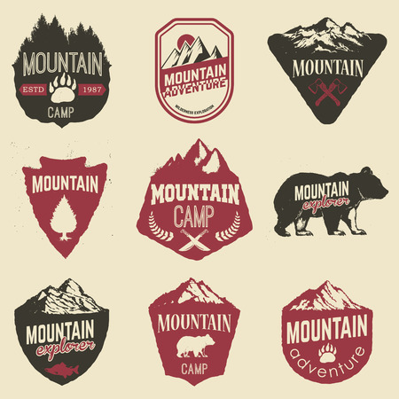 Hiking, mountains exploration labels and emblems. Vector illustration.のイラスト素材