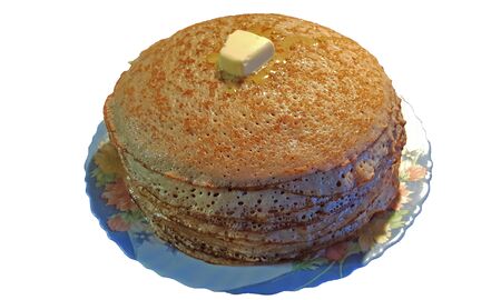 a lot of buckwheat pancakes with a slice of melting butterの写真素材