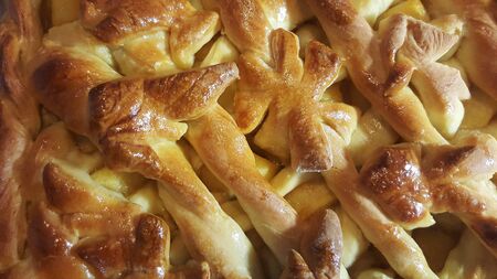 homemade freshly baked apple pie close-up with dough decorationの写真素材